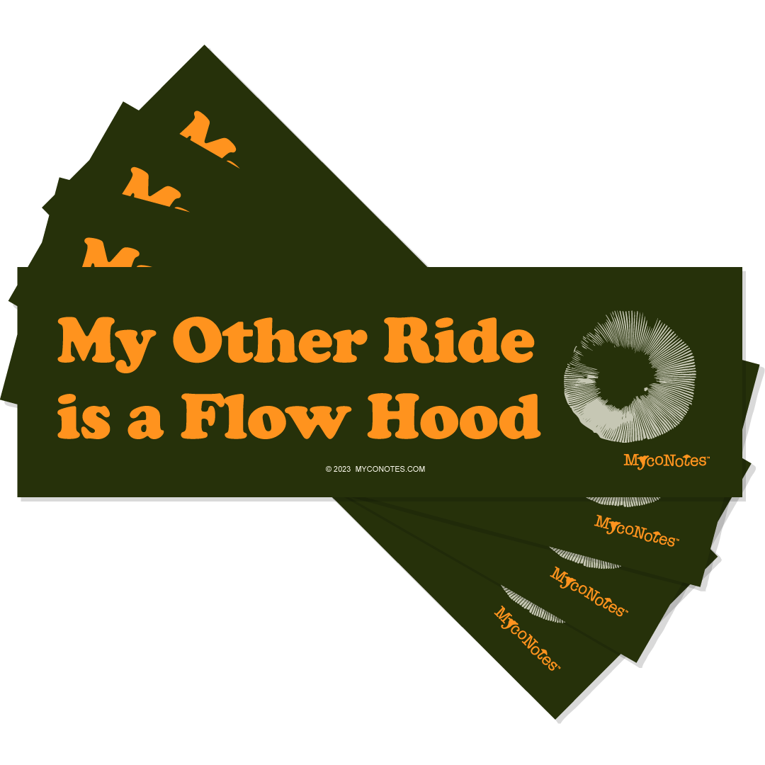 Stack of green bumper stickers with orange text 'My Other Ride is a Flow Hood' and a spore print illustration